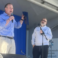 Congressman Josh Gottheimer addresses the crowd while Mayor Mark Schwartz looks on. (Brenda Sutcliffe) Congressman Josh Gottheimer addresses the crowd while Mayor Mark Schwartz looks on. (Brenda Sutcliffe)