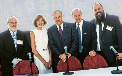 From left: Rabbi Professor Michael J. Broyde, Hon. Patty Shwartz, Senator Jon M. Bramnick, Esq., Abbe David Lowell, and Rabbi Shalom Lubin (Courtesy Jewish Law Symposium)