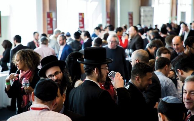The scene at last month’s Kosher Food and Wine Experience, which drew 2,500 foodies and oenophiles to Chelsea Piers. “Everybody is looking here to find out what’s new in the world of kosher wine,” says Royal Wine’s Nathan Herzog. Photos by Tzvi Simcha/Royal Wine Corp.