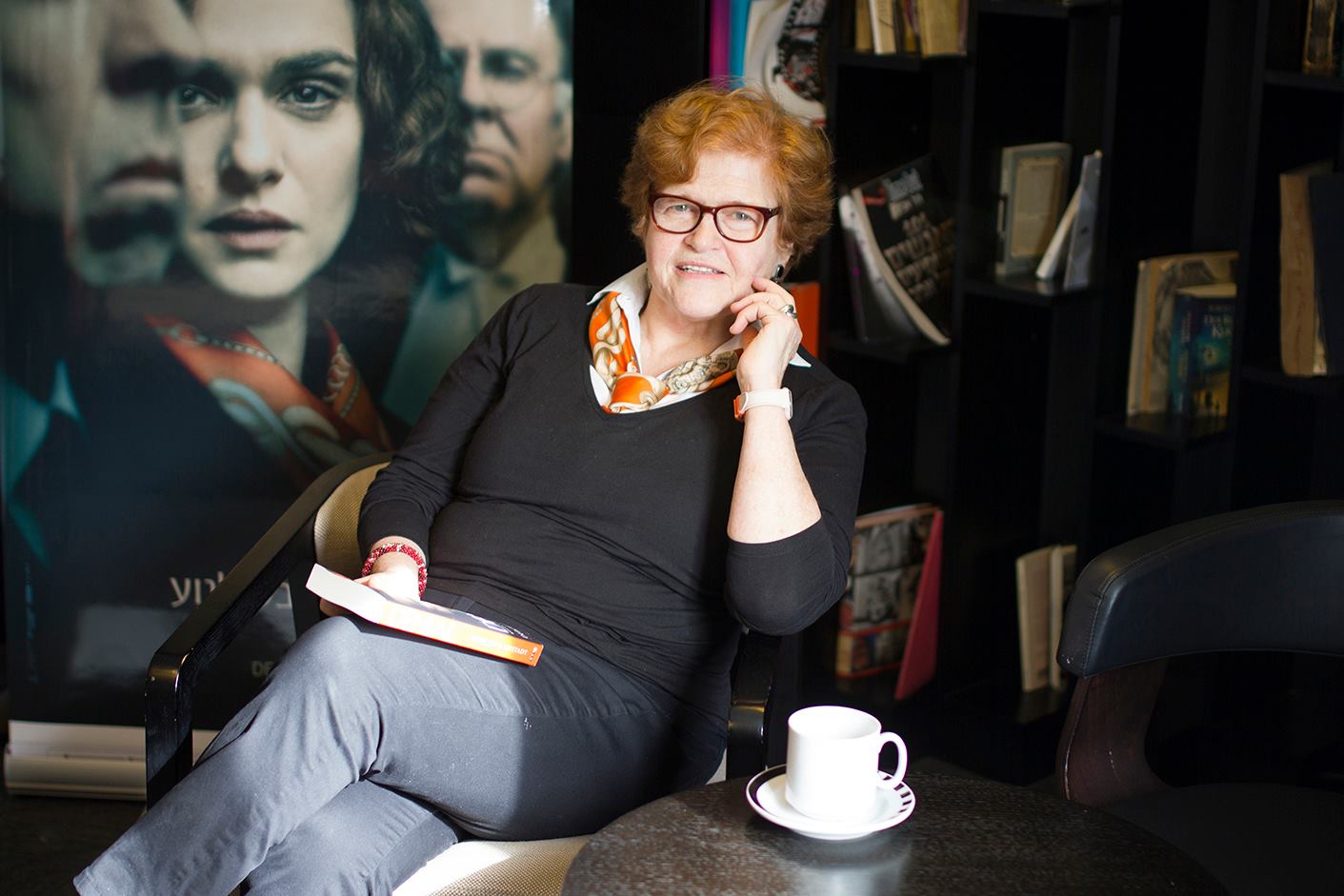 Deborah Lipstadt photographed in front of the poster for the 2017 film "Denial," based on her book "History on Trial: My Day in Court with a Holocaust Denier." Via Facebook