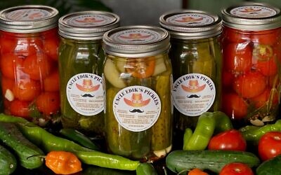 Former Wall Street analyst Edward Ilyasov launched Uncle Edik’s pickle shop in Queens, making him a culinary celebrity among the area’s Bukharian Jews. (Courtesy)