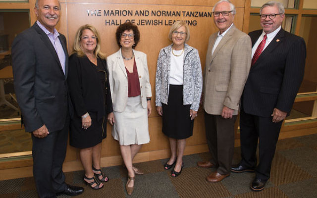 At the dedication ceremony of the Marion and Norman Tanzman Hall of Jewish Learning are, from left, Roy Tanzman and Brenda Tanzman, Bildner executive director Yael Zerubavel, Rona and Jeffries Shein, and Rutgers University chancellor Richard Edwards.