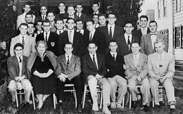 Members of Rho Epsilon, the Rutgers affiliate of Alpha Epsilon Pi, in 1957, together with their housemother.