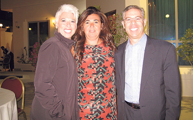 Michael and Lori Feldstein with Houda Nonoo, center, the Jewish woman who served as ambassador from Bahrain to the United States.     