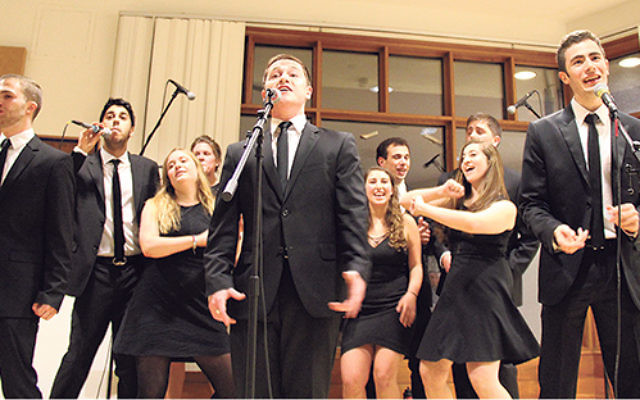 Louis Ades of Oakhurst, far right, sings with Shir Appeal at Tufts University