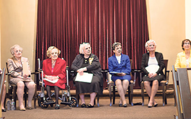 Rabbi Nasanayl Braun, right, congratulated nine adult women congregants who comprised the first-ever bat mitzva class at 119-year-old Congregation Brothers of Israel in Elberon. They are, from left, Madeline Forman, West Long Branch; Marlene Cohn, Oakhurs