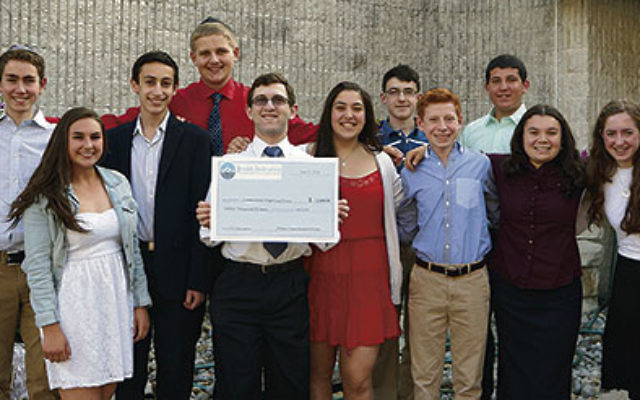 Ninth- and 10th-graders who have completed their philanthropic work with JTeam were honored for their work with the federation-affiliated teen group that distributed $12,000 to five charities.    