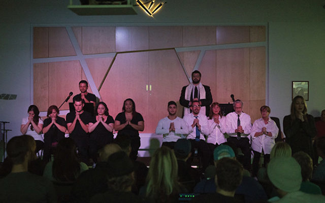 Benjamin Litchman, on right, second from left, who recovered from a heroin addiction with the help of Beit T’Shuvah, performs in “Freedom Song.” Photo courtesy Beit T’Shuvah