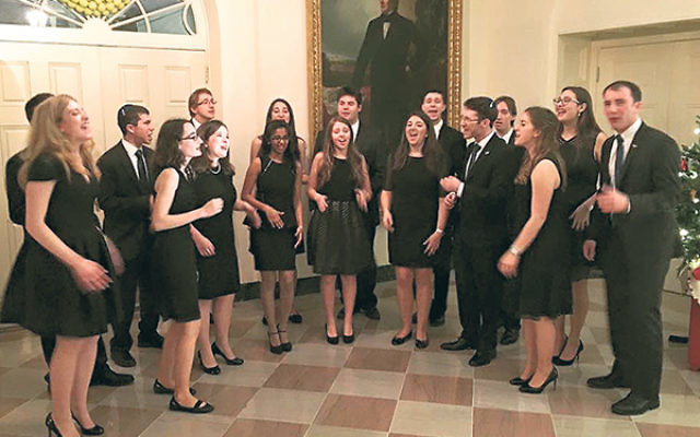 In performance at the White House: the Chai Notes with Kineret Brokman, front row, fifth from left, and Ilan Kaplan, back row, fourth from right.