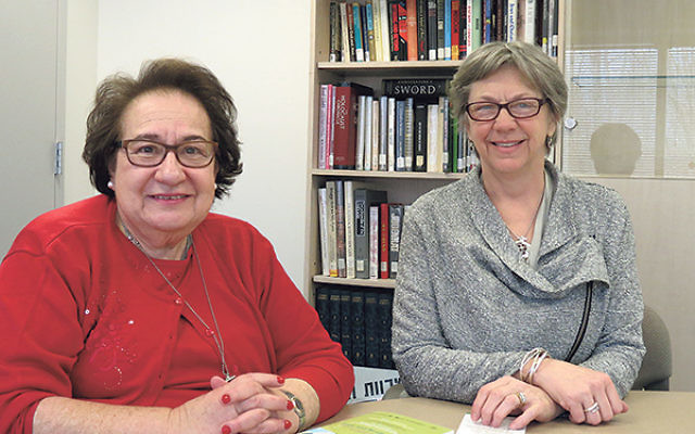 Cecille Asekoff, left, director of the Joint Chaplaincy Committee of Greater MetroWest and executive vice president of the National Association of Jewish Chaplains, and Beth Batastini, a faith community nurse at Christ Episcopal Church in Newton, discuss