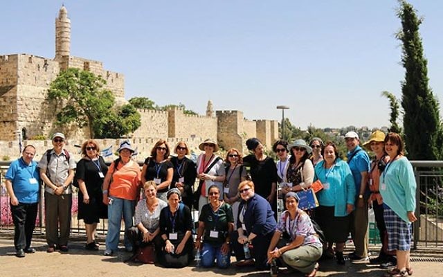 Jewish chaplains and health caregivers join with Israeli counterparts for a four-day seminar held in Arad and Ashdod in May. The group is photographed in Jerusalem. Cecille Asekoff is fourth from the right, standing. Photo courtesy Joint Chaplaincy Commit
