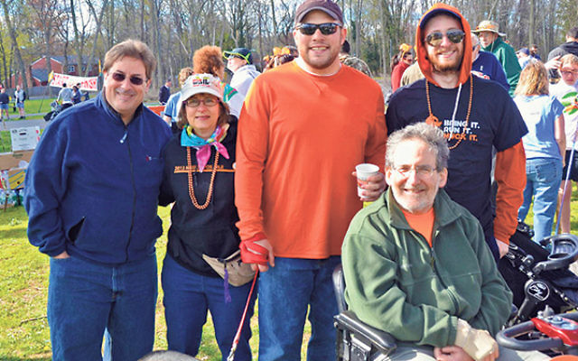 At last year’s MS Walk, 2015 Metro NJ Ambassadors Aaron, seated, and Laura Cohen with teammates, from left, Harris Nydick, son-in-law Rabbi Scott Roland, and son Jonathan.