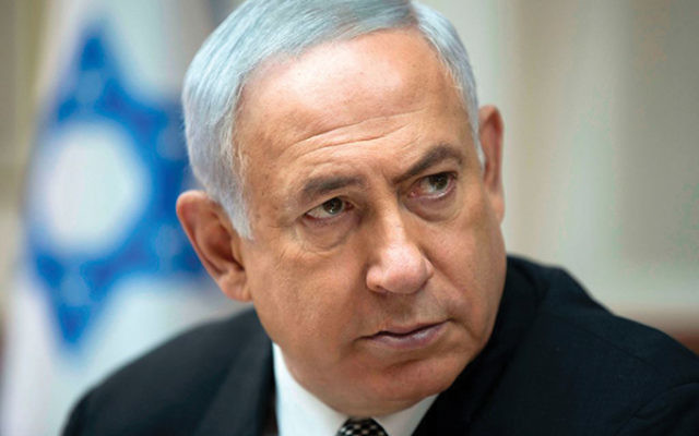 Prime Minister Benjamin Netanyahu at his weekly cabinet meeting on Sept. 3. ABIR SULTAN/AFP/Getty Images