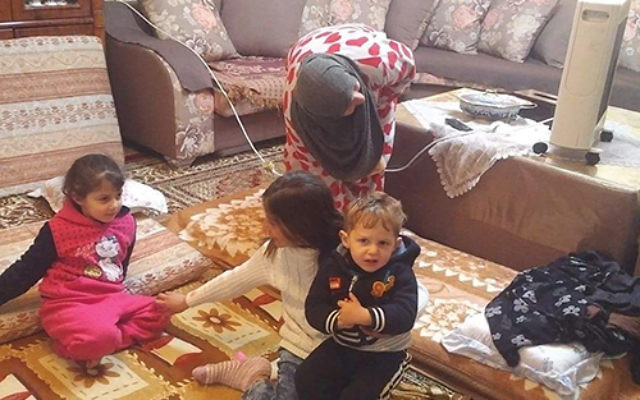 Assad’s wife and some of his children in the Arab village of Haja. Photo courtesy Rosanne Skopp 