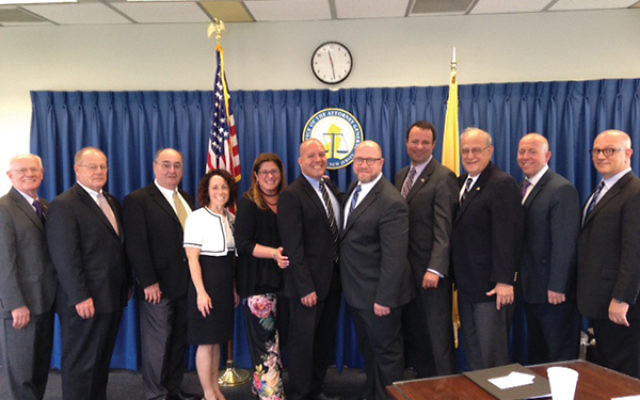 Federation leaders and state officials at the security meeting included, from left, Jacob Toporek, Col. Rick Fuentes, Drew Staffenberg, Robin Wishnie, Jennifer Dubrow-Weiss, Jason Shames, Christopher Porrino, Dov Ben-Shimon, Gordon Haas, Keith Krivitzky,