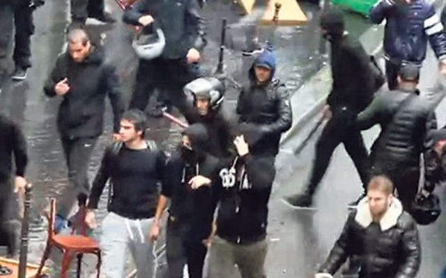 French Jews fighting pro-Palestinian rioters on the Paris street where the Synagogue de la Roquette is located, July 13.    