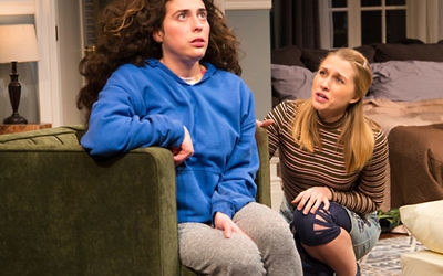 Laura Lapidus, left, as Daphna, engages with her cousin Liam’s “shiksa” girlfriend, Melody (Maddie Jo Landers), in George Street Playhouse's production of “Bad Jews.” Photo by T. Charles Erickson.