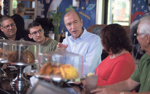 Rep. Scott Garrett campaigns for reelection in July at the Oakland Diner.     