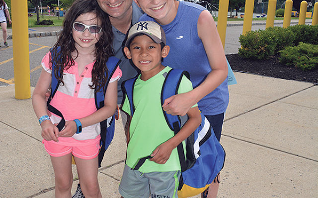 Scott Lantzman on the first day of camp, 2015, with his children.