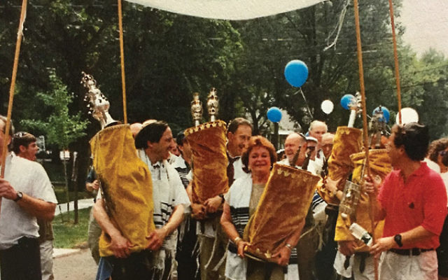 The Torah procession from Suburban Jewish Center Mekor Chayim to Temple Beth-El when the synagogues merged in 1998.