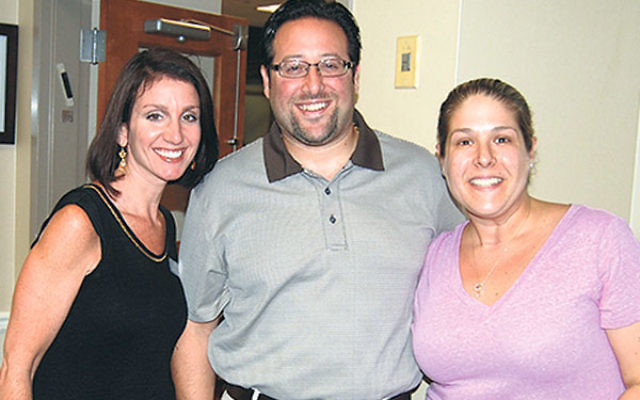Jennifer Mamlet, left, executive director of the JCC of Central NJ, and Ryan and Courtney Teicher were all sticking to their plans to travel to Israel.     