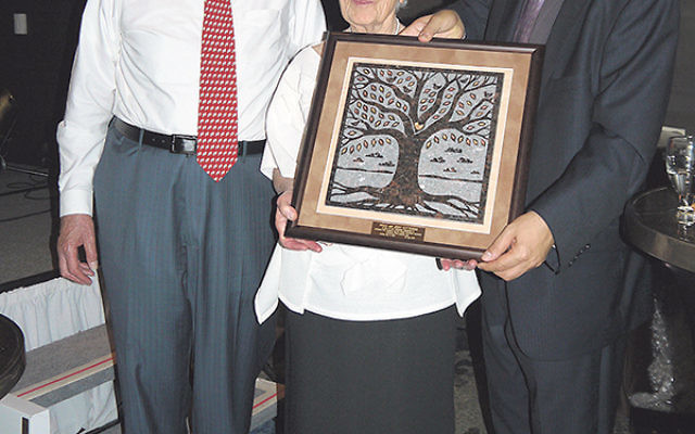 Honorees Paula and Jerry Gottesman with Gottesman RTW Academy head of school Moshe Vaknin.    