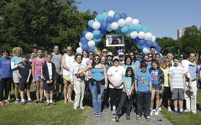 Temple B’nai Shalom congregants gather in Buccleuch Park in New Brunswick for the first annual Cantor Kenneth Gould Memorial 5K Walk.     