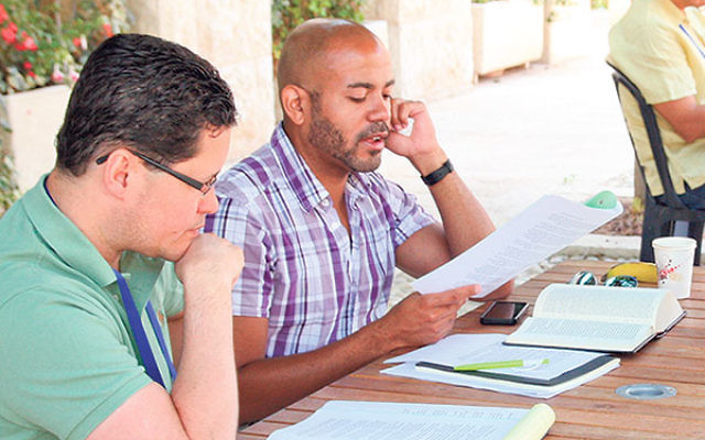 Javier Viera, dean of the Drew University Theological School, left, and Brian Rainey, assistant professor of Old Testament at Princeton Theological Seminary, study at the Hartman Institute in Jerusalem. 