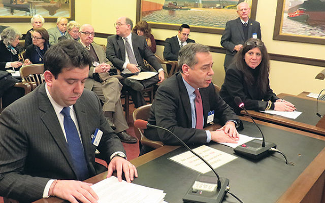 Local and national Jewish officials who spoke before the Senate committee that unanimously passed a resolution condemning anti-Semitism included, from left, Joshua Cohen of the Anti-Defamation League, Mark Weitzman of the Simon Wiesenthal Center, and Mela