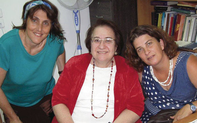 In Jerusalem Cecille Asekoff, center, confers with certified Israeli spiritual care providers Einat Ramon, left, and Hila Zemer.     
