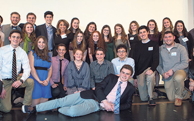 Jewish Community Youth Foundation founder Ricky Shechtel, back row, fifth from left, with the program’s graduating seniors.     