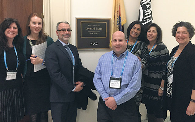 On Jewish Disability Advocacy Day, meeting with Mollie McDonnell, second from left, legislative aide to Rep. Scott Garrett, are, from left, Melanie Roth Gorelick, John Winer, Larry Mandel, Addy Bonet, Linda Press, and Rebecca Wanatick.