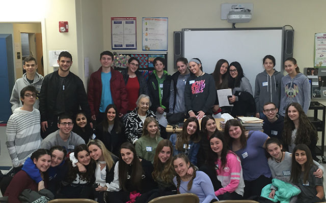 Holocaust survivor Edith Reich, surrounded by J-Serve teens, told them about her experiences and the importance of helping others. Photo courtesy Jewish Federation in the Heart of NJ
