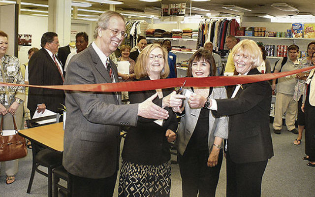 Retired JVS executive director Leonard Schneider presides at the 2011 ribbon-cutting ceremony for the agency’s Career Center for Individuals with an Autism Spectrum Disorder.    