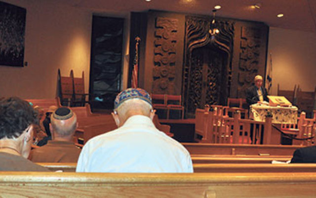 Rabbi Adam Feldman spoke about murdered Israeli teenagers at an evening service held in their memory.