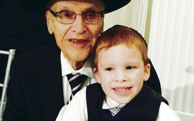 Rabbi Meyer Korbman, shown with a great-grandson