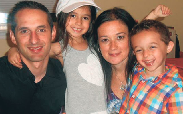 Darren Lederman with his wife, Stacey, and their children, Emma and Noah.     