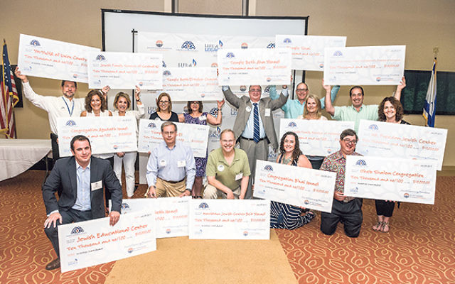Each local organization that successfully received 18 Create a Jewish Legacy gifts was promised a $10,000 check, which was delivered at a breakfast on July 29.