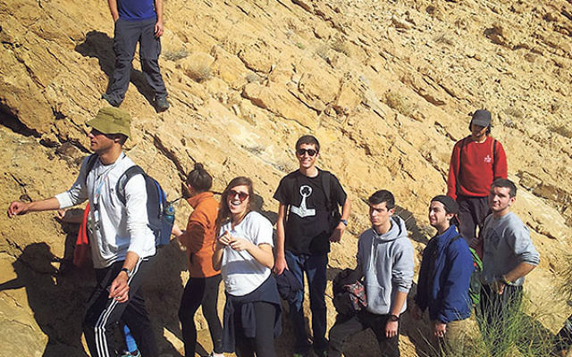 Jacob Lichtblau, center, in black with sunglasses, hiking with fellow Young Judaea Year Course students near Sde Boker in the Negev.