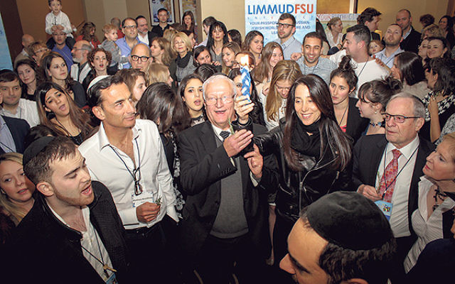 Limmud participants take part in a Havdala ceremony.     