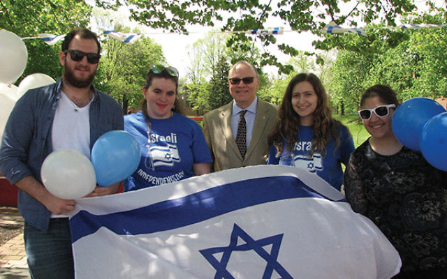 Students at Montclair State University Hillel celebrate Yom Ha’Atzmaut at the center of campus just days after BDS legislation failed in a student government vote. Photos by Johanna Ginsberg