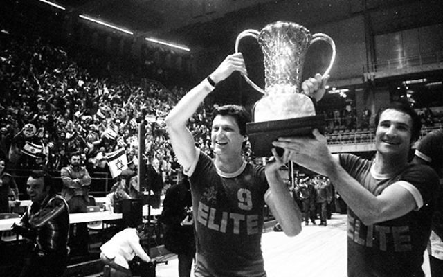 Tal Brody, right, celebrates with the European Basketball Championship trophy following Maccabi Tel Aviv’s win over the Red Army.     