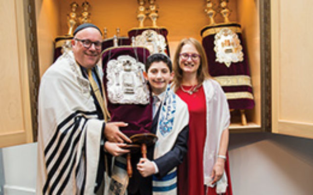 Nathan Mirsky flanked by Rabbi Avi Friedman and Cantor Janet Roth at Congregation Ohr Shalom: Summit JCC. Photo by Erin Usawicz 