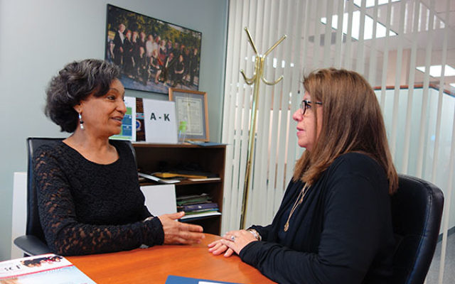 Aster Yilma, left, a client at the NCJW/Essex Center for Women, consults with career services manager Patty Kremen. Photos by Robert Wiener