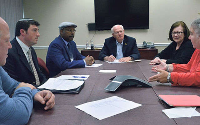 At a NJ State Association of Jewish Federations gathering at the JCC of Central NJ in Scotch Plains, Knesset Member Dr. Avraham Neguise, third from left, meets with leaders, from left, Bob Kuchner, a board member of the Jewish Agency for Israel and of the