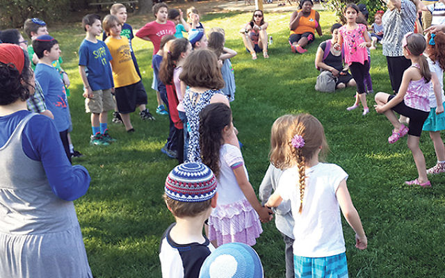 A Lag Ba’Omer PJ Library Barbecue last year — which featured a representative from the Nefesh Yehudi Academy and was aimed at Israeli-born adults with children — received a microgrant from the Middlesex federation, which cosponsored the
