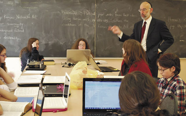 An eighth-grade Talmud class at the Pre-Collegiate Learning Center, April 2012.     