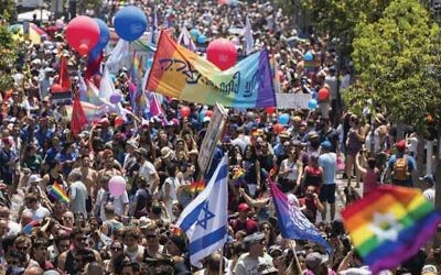 Tens of thousands of celebrants pack the streets of Tel Aviv on June 9 for the annual gay pride parade. JACK GUEZ/AFP/Getty Images