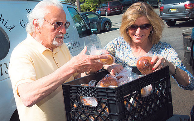 Volunteers distribute Meals-on-Wheels for the Jewish Family Service of Middlesex County. 