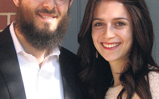 Avremy and Shaina Raksin, outside their Morristown apartment, say they aim to spread happiness through their role at Congregation Ahavath Yisrael. 
